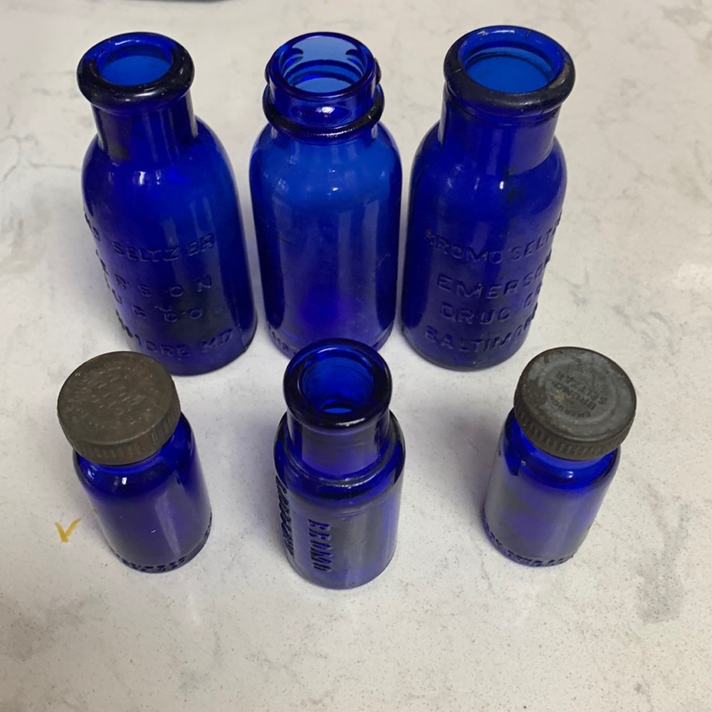 Set of six antique Bromo Seltzer bottles.